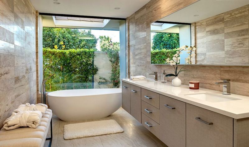 Primary bath with garden window and freestanding tub