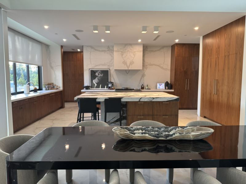 Kitchen and dining with marble backsplash
