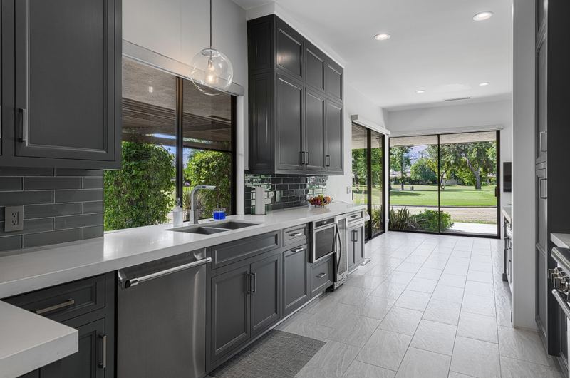 Kitchen with charcoal cabinetry